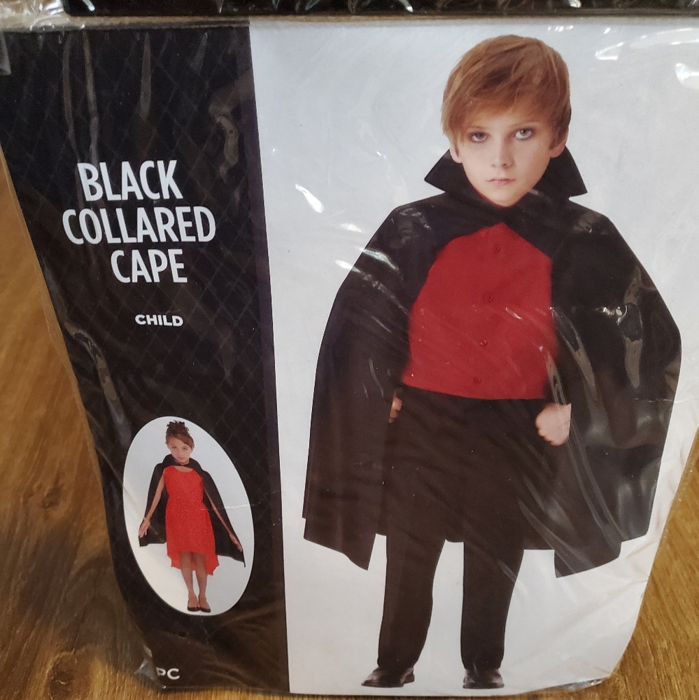 Children's black collared cape.  New in package
